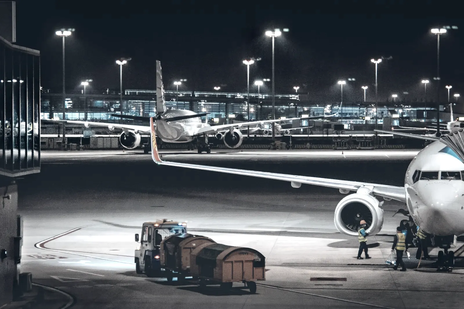 Aircraft being loaded on the apron at night